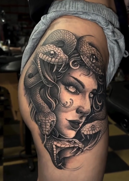 Medusa black and grey hip tattoo